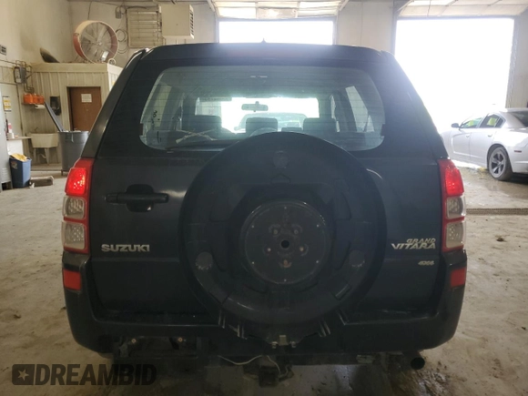 2008 Suzuki Grand Vitara w/Spare & Cargo Covers z VIN JS3TD941584102389, wystawiony jako Copart lot #55044795 z przebiegiem 193 680 mil mil oraz Szkoda całkowita • Salvage title. Historia ofert i sprzedaży dostępna na DreamBid. Obrazek 6.