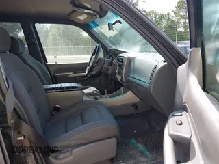 2001 Ford Explorer Sport Trac z VIN 1FMZU67E91UC81138, wystawiony jako IAAI lot #42612240 z przebiegiem 196 515 mil mil oraz . Historia ofert i sprzedaży dostępna na DreamBid. Obrazek 5.