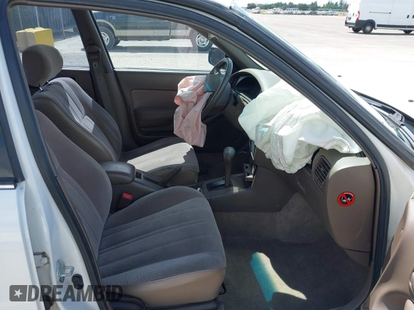 1996 Toyota Camry DX z VIN JT2BG12K8T0368612, wystawiony jako IAAI lot #42248750 z przebiegiem 122 237 mil mil oraz . Historia ofert i sprzedaży dostępna na DreamBid. Obrazek 5.