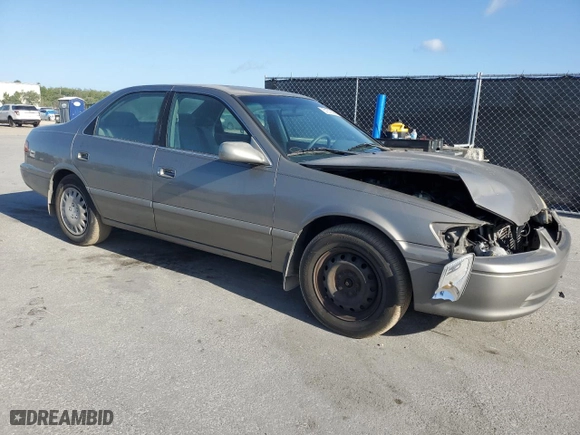 2000 Toyota Camry CE with VIN 4T1BG22K0YU009702, listed as a Copart auction lot 51870605 with 77,262 mi miles and Clean Title. Bid and sale history available at carsss.com. Image 4.