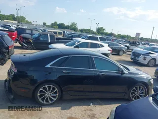 2018 Lincoln MKZ Select z VIN 3LN6L5C90JR625598, wystawiony jako IAAI lot #42189498 z przebiegiem 98 803 mil mil oraz . Historia ofert i sprzedaży dostępna na DreamBid. Obrazek 12.