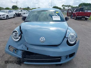 2013 Volkswagen Beetle 2.5L с VIN 3VWJX7AT8DM631449, выставлен на аукционе IAAI как лот 40064318 с пробегом 178 311 миль миль и . История ставок и продаж доступна на DreamBid. Изображение 6.