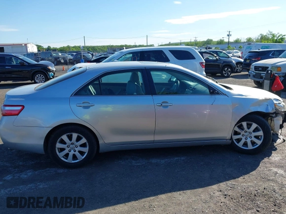 2007 Toyota Camry LE z VIN JTNBK46K473003622, wystawiony jako IAAI lot #42286264 z przebiegiem 105 630 mil mil oraz . Historia ofert i sprzedaży dostępna na DreamBid. Obrazek 14.
