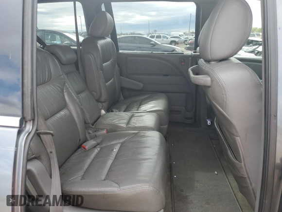 2010 Honda Odyssey EX-L with VIN 5FNRL3H72AB055070, listed as a Copart auction lot 80328974 with 221,467 mi miles and Salvage Title. Bid and sale history available at DreamBid. Image 11.