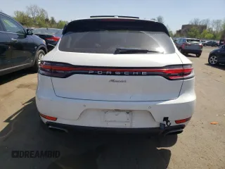 2021 Porsche Macan z VIN WP1AA2A5XMLB09303, wystawiony jako Copart lot #54544005 z przebiegiem Nie podano mil oraz Szkoda całkowita • Salvage title. Historia ofert i sprzedaży dostępna na DreamBid. Obrazek 6.