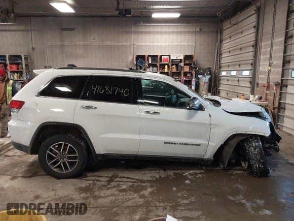 2021 Jeep Grand Cherokee 80th Anniversary with VIN 1C4RJFBG7MC611827, listed as a IAAI auction lot 41631740 with 85,253 mi miles and . Bid and sale history available at DreamBid. Image 14.