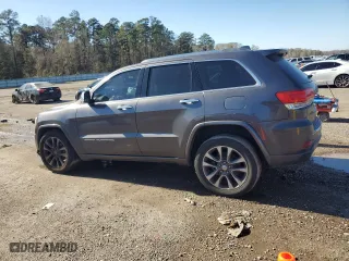 2017 Jeep Grand Cherokee Overland with VIN 1C4RJECGXHC696676, listed as a Copart auction lot 86885924 with 154,754 mi miles and Salvage Title. Bid and sale history available at carsss.com. Image 2.