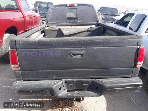 2000 Dodge Dakota SLT with VIN 1B7GG22X1YS655459, listed as a Copart auction lot 84569564 with 240,478 mi miles and Non Repairable. Bid and sale history available at DreamBid. Image 6.