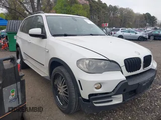 2009 BMW X5 30i with VIN 5UXFE43559L274508, listed as a IAAI auction lot 42123256 with 137,374 mi miles. Bid and sale history available at carsss.com. Image 1.