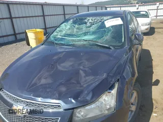 2014 Chevrolet Cruze 1LT with VIN 1G1PC5SB9E7114104, listed as a IAAI auction lot 42143300 with 161,552 mi miles and . Bid and sale history available at DreamBid. Image 6.