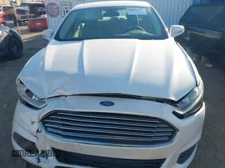 2013 Ford Fusion SE Hybrid with VIN 3FA6P0LU9DR375403, listed as a IAAI auction lot 40995125 with 132,583 mi miles. Bid and sale history available at carsss.com. Image 12.