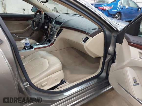 2011 Cadillac CTS Luxury with VIN 1G6DG5EY9B0135220, listed as a IAAI auction lot 42596045 with 158,912 mi miles and . Bid and sale history available at DreamBid. Image 5.