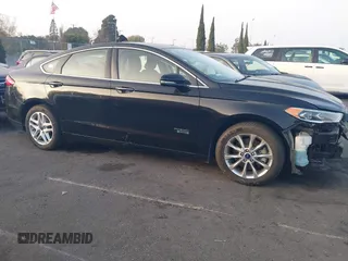2018 Ford Fusion Energi SE with VIN 3FA6P0PU7JR232567, listed as a IAAI auction lot 41219232 with 54,049 mi miles. Bid and sale history available at carsss.com. Image 14.