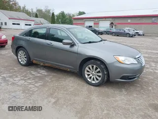 2012 Chrysler 200 Touring with VIN 1C3CCBBB7CN185058, listed as a IAAI auction lot 42289296 with 141,754 mi miles and . Bid and sale history available at DreamBid. Image 1.