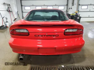 1994 Chevrolet Camaro z VIN 2G1FP22S0R2105030, wystawiony jako Copart lot #45131955 z przebiegiem 166 107 mil mil oraz Czysty tytuł • Clean title. Historia ofert i sprzedaży dostępna na DreamBid. Obrazek 6.