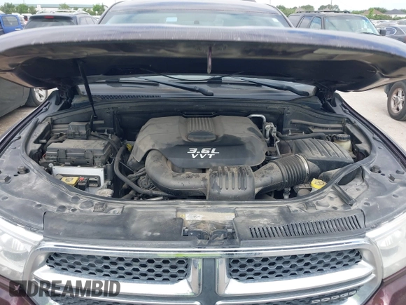 2012 Dodge Durango Crew with VIN 1C4RDHDG7CC144357, listed as a IAAI auction lot 42019204 with 174,408 mi miles and . Bid and sale history available at DreamBid. Image 10.