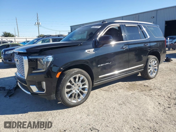 2024 GMC Yukon Denali with VIN 1GKS2DKL8RR173831, listed as a Copart auction lot 87831265 with 32,872 mi miles and Salvage Title. Bid and sale history available at carsss.com. Image 1.