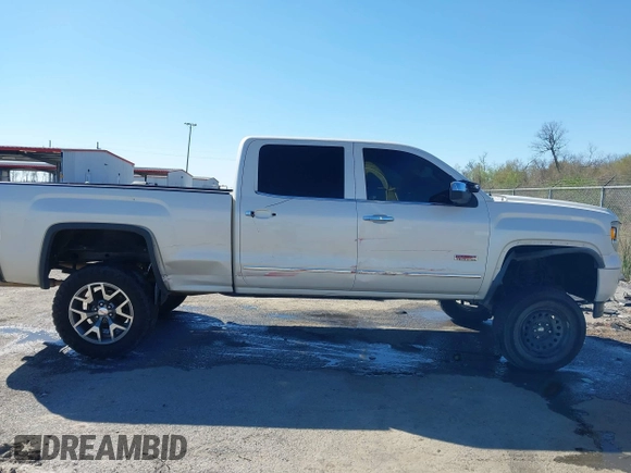 2014 GMC Sierra 1500 SLT with VIN 3GTU2VEC0EG208569, listed as a IAAI auction lot 41834893 with 128,731 mi miles and . Bid and sale history available at DreamBid. Image 13.