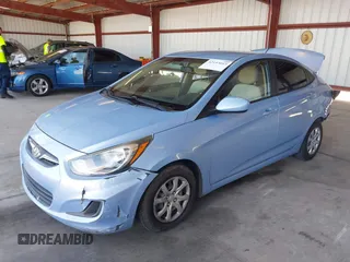 2014 Hyundai Accent GLS with VIN KMHCT4AE8EU704450, listed as a IAAI auction lot 42153043 with 139,715 mi miles. Bid and sale history available at carsss.com. Image 2.
