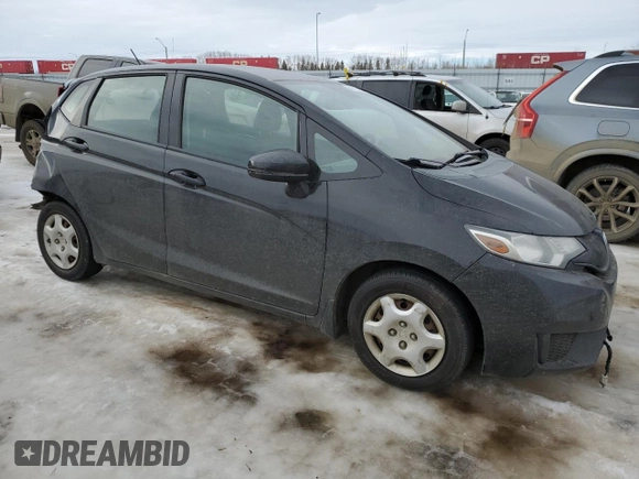 2015 Honda Fit LX with VIN 3HGGK5H50FM106879, listed as a Copart auction lot 46728995 with 95,994 mi miles and Salvage title. Bid and sale history available at DreamBid. Image 4.