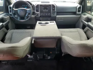 2016 Ford F-150 XLT with VIN 1FTEW1C86GKD79757, listed as a Copart auction lot 54757115 with 161,535 mi miles and Salvage title. Bid and sale history available at DreamBid. Image 8.