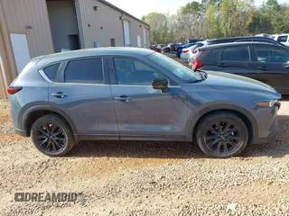 2023 Mazda CX-5 S Preferred with VIN JM3KFBCM3P0154043, listed as a IAAI auction lot 41928648 with 41,904 mi miles and . Bid and sale history available at carsss.com. Image 13.