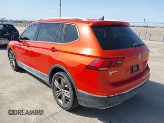 2018 Volkswagen Tiguan SEL Premium with VIN 3VV5B7AX8JM116146, listed as a IAAI auction lot 41738184 with 163,731 mi miles and . Bid and sale history available at DreamBid. Image 3.