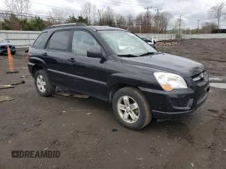 2009 Kia Sportage LX with VIN KNDJE723097622429, listed as a Copart auction lot 52960575 with 167,492 mi miles and Salvage Title. Bid and sale history available at carsss.com. Image 4.