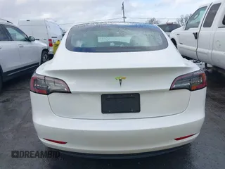 2020 Tesla Model 3 Standard Range Plus with VIN 5YJ3E1EA0LF741311, listed as a IAAI auction lot 41581931 with 43,284 mi miles. Bid and sale history available at carsss.com. Image 16.