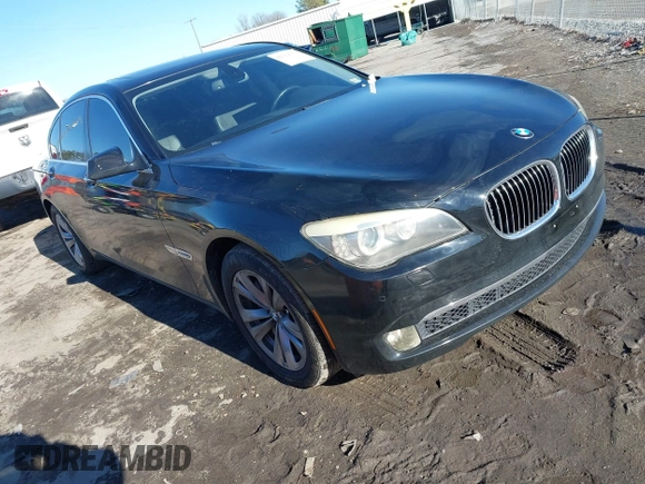 2011 BMW 7 Series 740i with VIN WBAKA4C58BC392020, listed as a IAAI auction lot 41314751 with 116,553 mi miles. Bid and sale history available at carsss.com. Image 1.