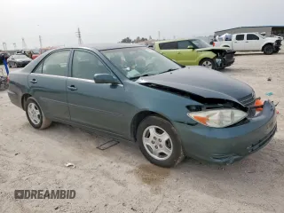 2003 Toyota Camry LE z VIN 4T1BF32K13U554339, wystawiony jako Copart lot #55972595 z przebiegiem 69 549 mil mil oraz Szkoda całkowita • Salvage title. Historia ofert i sprzedaży dostępna na DreamBid. Obrazek 4.