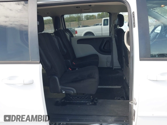 2014 Dodge Grand Caravan American Value with VIN 2C4RDGBG8ER140342, listed as a IAAI auction lot 42198306 with 135,564 mi miles and . Bid and sale history available at DreamBid. Image 8.
