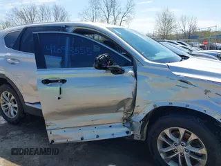 2019 Hyundai Santa Fe SEL with VIN 5NMS33AD1KH101182, listed as a IAAI auction lot 42093555 with 93,473 mi miles and . Bid and sale history available at DreamBid. Image 6.