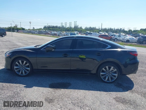 2020 Mazda 6 Touring with VIN JM1GL1VMXL1517828, listed as a IAAI auction lot 41511804 with 123,174 mi miles. Bid and sale history available at carsss.com. Image 14.