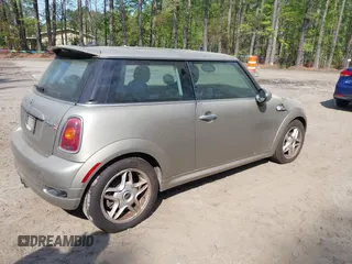 2010 MINI Hardtop S with VIN WMWMF7C58ATX45365, listed as a IAAI auction lot 42035404 with 26,393 mi miles and . Bid and sale history available at DreamBid. Image 4.