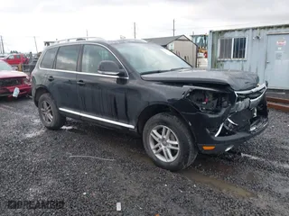 2009 Volkswagen Touareg 2 VR6 with VIN WVGBE77L29D010730, listed as a IAAI auction lot 41109415 with 230,325 mi miles. Bid and sale history available at carsss.com. Image 1.