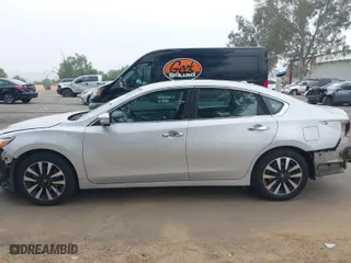 2018 Nissan Altima 2.5 SR with VIN 1N4AL3APXJC248951, listed as a IAAI auction lot 42025155 with 106,338 mi miles. Bid and sale history available at carsss.com. Image 15.