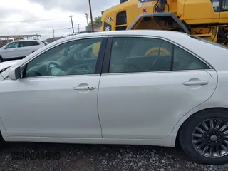 2007 Toyota Camry z VIN 4T1BB46K67U027737, wystawiony jako IAAI lot #42320986 z przebiegiem 142 606 mil mil oraz . Historia ofert i sprzedaży dostępna na DreamBid. Obrazek 14.