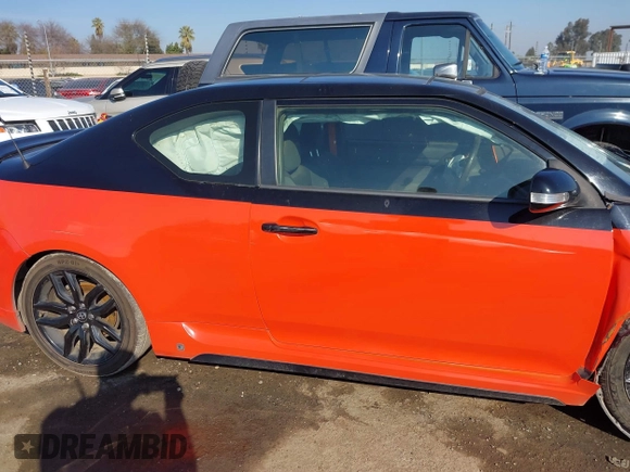 2015 Scion tC with VIN JTKJF5C71FJ006863, listed as a IAAI auction lot 41332681 with 91,559 mi miles. Bid and sale history available at carsss.com. Image 20.