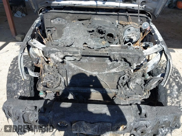 2015 Jeep Wrangler Altitude z VIN 1C4GJWBG2FL714146, wystawiony jako IAAI lot #41417659 z przebiegiem Nie podano mil oraz . Historia ofert i sprzedaży dostępna na DreamBid. Obrazek 10.