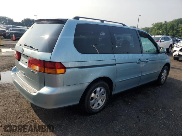 2003 Honda Odyssey EX-L с VIN 2HKRL18033H501741, выставлен на аукционе Copart как лот 60496865 с пробегом Не указан миль и Списание • Salvage title. История ставок и продаж доступна на DreamBid. Изображение 3.