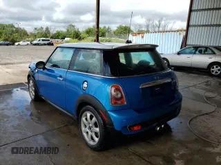 2009 MINI Hardtop S with VIN WMWMF73539TW83580, listed as a Copart auction lot 80143763 with 96,464 mi miles and Salvage Title. Bid and sale history available at DreamBid. Image 2.