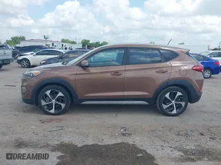 2017 Hyundai Tucson Value with VIN KM8J33A27HU430198, listed as a IAAI auction lot 42104369 with 163,929 mi miles. Bid and sale history available at carsss.com. Image 14.