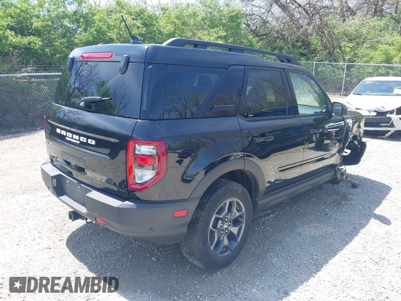 2021 Ford Bronco Sport Badlands z VIN 3FMCR9D98MRA67396, wystawiony jako IAAI lot #42080134 z przebiegiem 52 300 mil mil oraz . Historia ofert i sprzedaży dostępna na DreamBid. Obrazek 4.