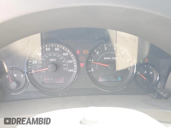 2005 Jeep Grand Cherokee Laredo with VIN 1J4HR48N65C608296, listed as a Copart auction lot 58862875 with 168,421 mi miles and Salvage title. Bid and sale history available at DreamBid. Image 9.