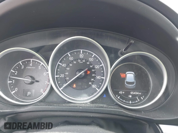 2018 Mazda CX-5 Touring with VIN JM3KFBCMXJ0438177, listed as a IAAI auction lot 42152275 with 65,434 mi miles and . Bid and sale history available at carsss.com. Image 7.