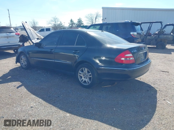 2005 Mercedes-Benz E-Class 3.2L with VIN WDBUF65J65A695704, listed as a IAAI auction lot 41618041 with 1 mi miles. Bid and sale history available at carsss.com. Image 3.