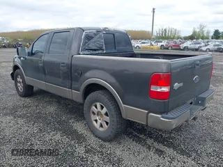 2005 Ford F-150 XLT with VIN 1FTPW12555KE71004, listed as a IAAI auction lot 42023000 with 185,051 mi miles. Bid and sale history available at carsss.com. Image 3.