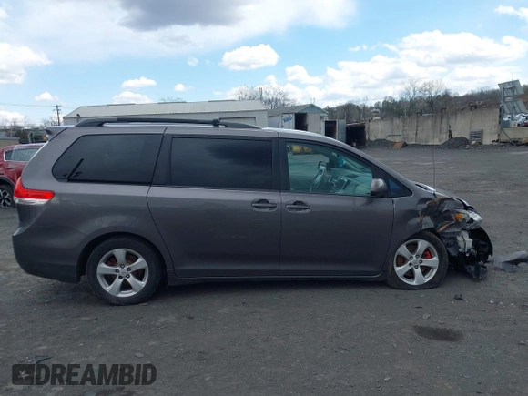 2013 Toyota Sienna LE with VIN 5TDJK3DC1DS049621, listed as a IAAI auction lot 42027930 with 206,148 mi miles and . Bid and sale history available at DreamBid. Image 13.