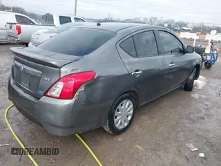 2016 Nissan Versa S Plus with VIN 3N1CN7APXGL842122, listed as a IAAI auction lot 41306018 with 211,746 mi miles. Bid and sale history available at carsss.com. Image 4.